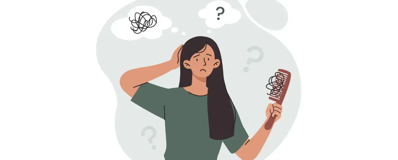 Mujer preocupada por la ca&iacute;da del cabello, pensando si la vitamina D es buena para el pelo.
